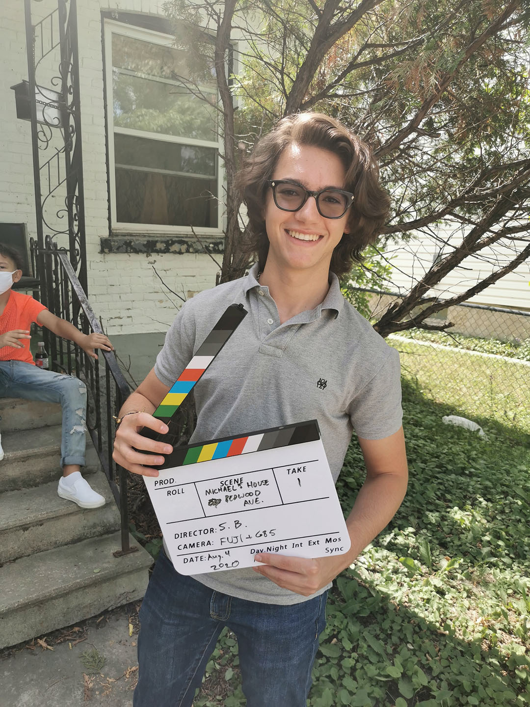 a director with a clapperboard